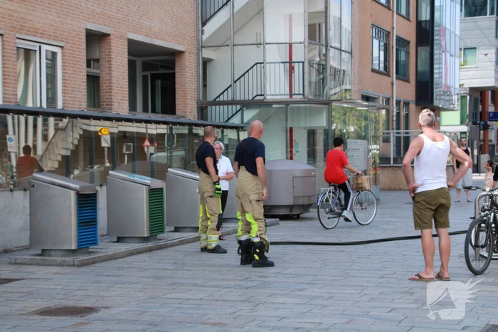 Brand in ondergrondse container