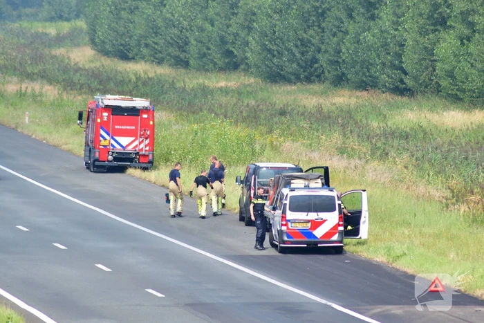 Bestuurder ziet rokende aanhanger