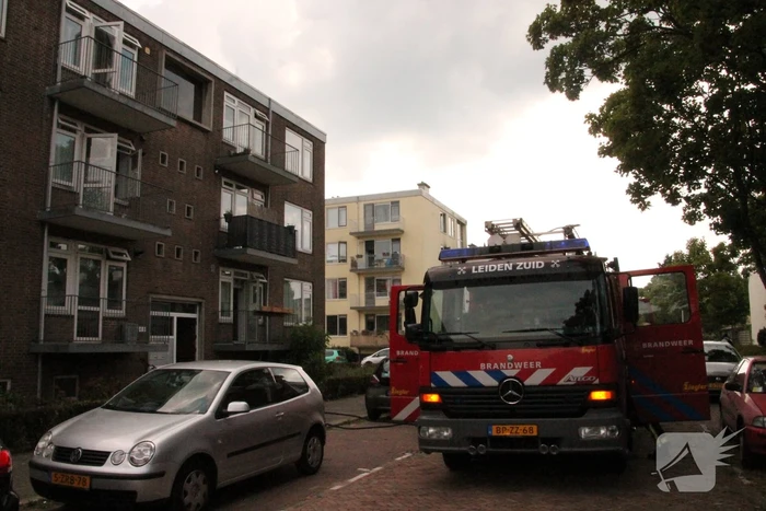 Brand in keuken van flatwoning