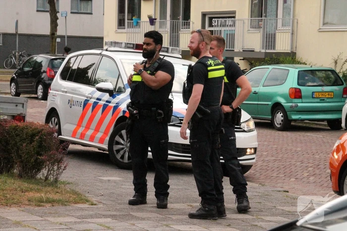 Brand in keuken van flatwoning