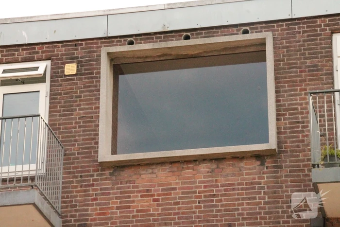 Brand in keuken van flatwoning