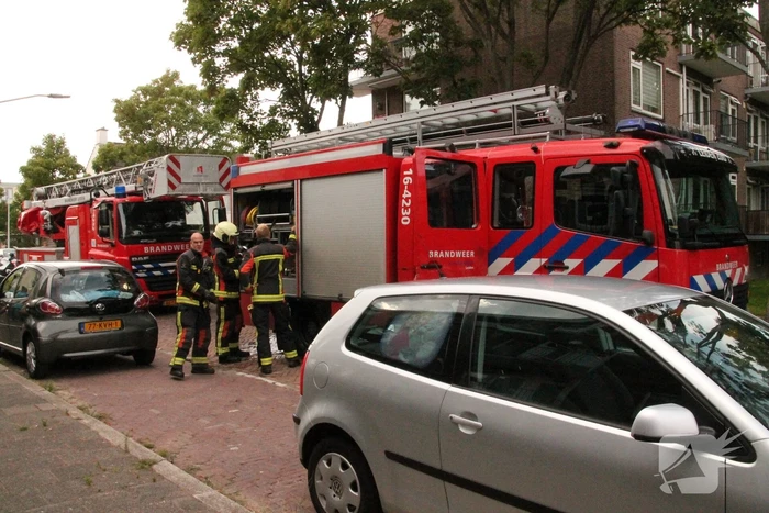 Brand in keuken van flatwoning
