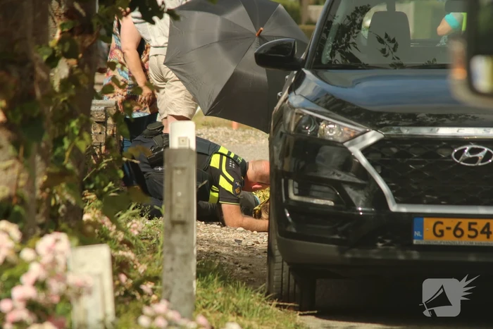 Opzittende scooter gewond na val