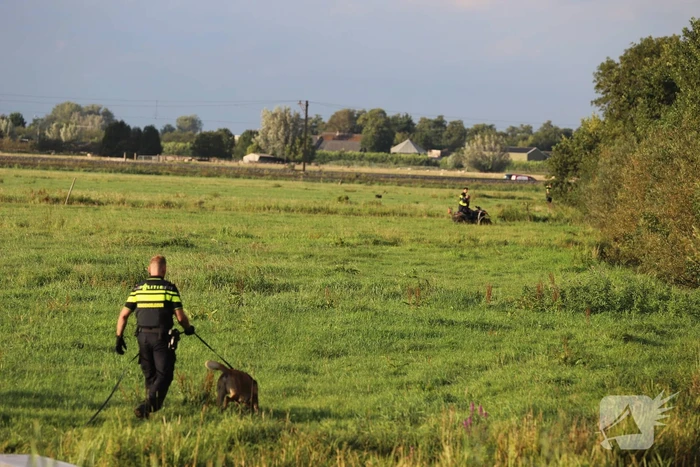 Zoekactie naar boeven in maisveld en water