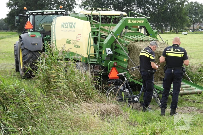 E-biker komt in botsing met grootpakpers