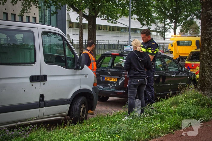 Schade na kop-staart aanrijding