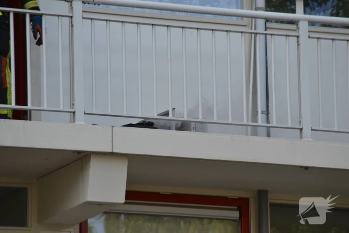 Magnetron in flatwoning vliegt in brand