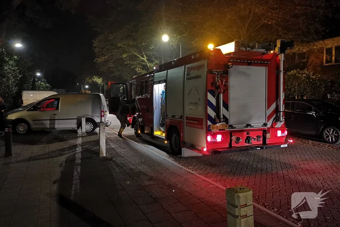 Brand in keuken van flatwoning