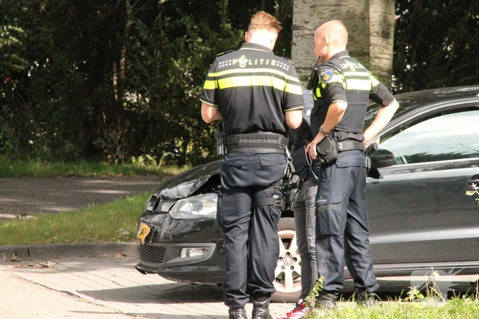 Blikschade bij botsing tussen drie auto's