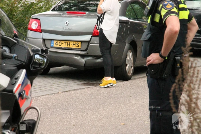 Blikschade bij botsing tussen drie auto's