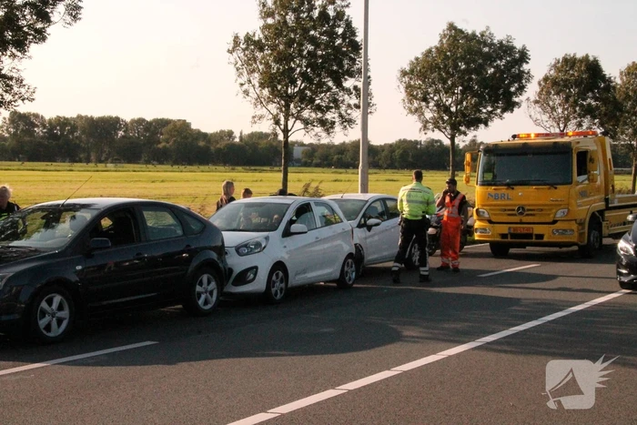 Forse schade na aanrijding met drie auto's