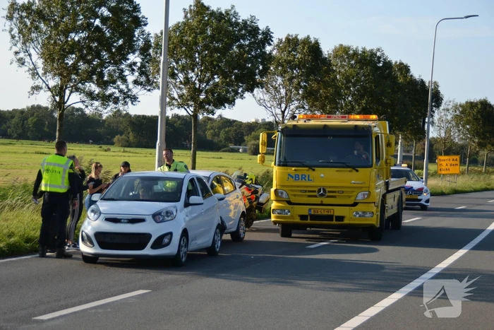 Forse schade na aanrijding met drie auto's