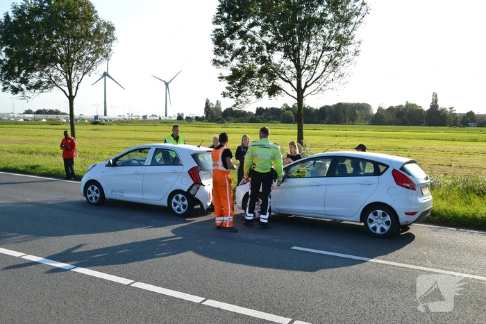 Forse schade na aanrijding met drie auto's