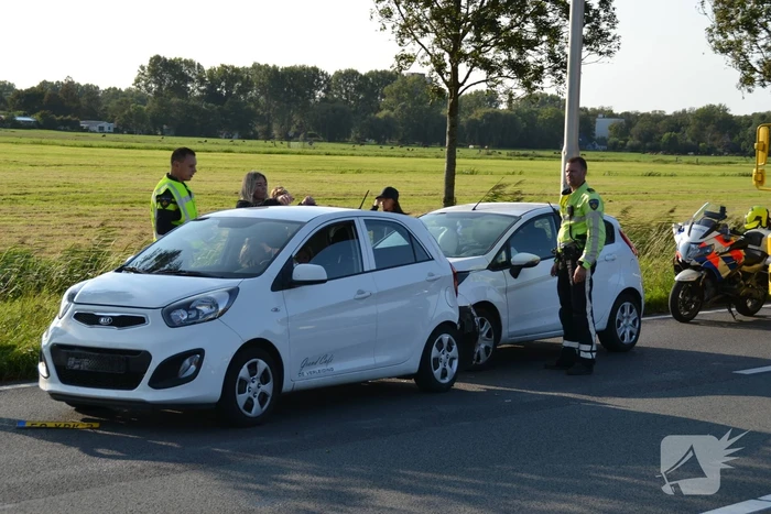Forse schade na aanrijding met drie auto's