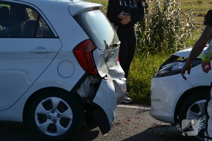 Forse schade na aanrijding met drie auto's