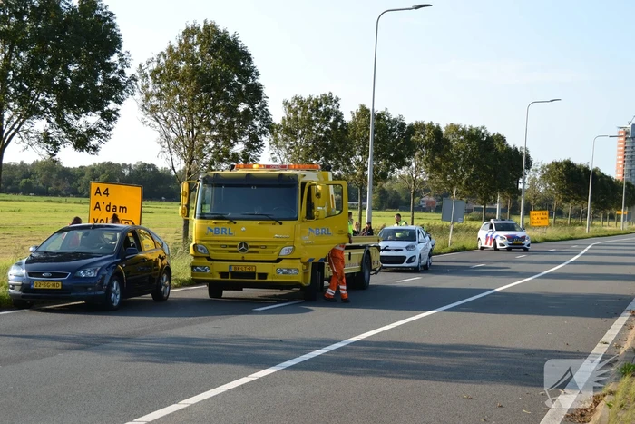 Forse schade na aanrijding met drie auto's