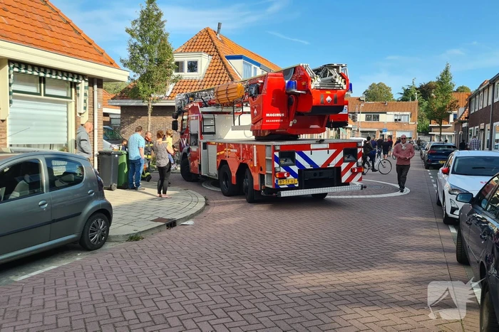 Brand in achtertuin van woning