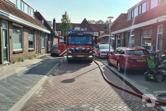 Brand in achtertuin van woning