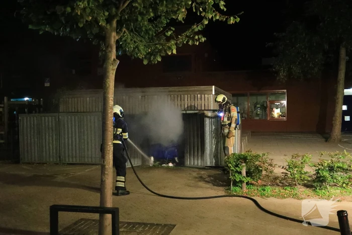 Papiercontainer verwoest door brand