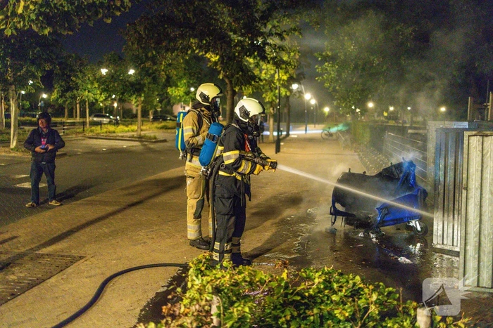 Papiercontainer verwoest door brand