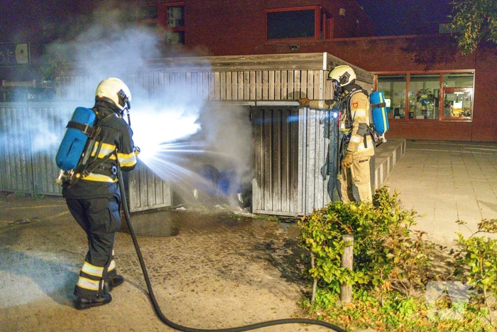 Papiercontainer verwoest door brand