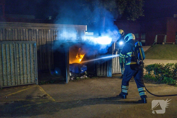 Papiercontainer verwoest door brand