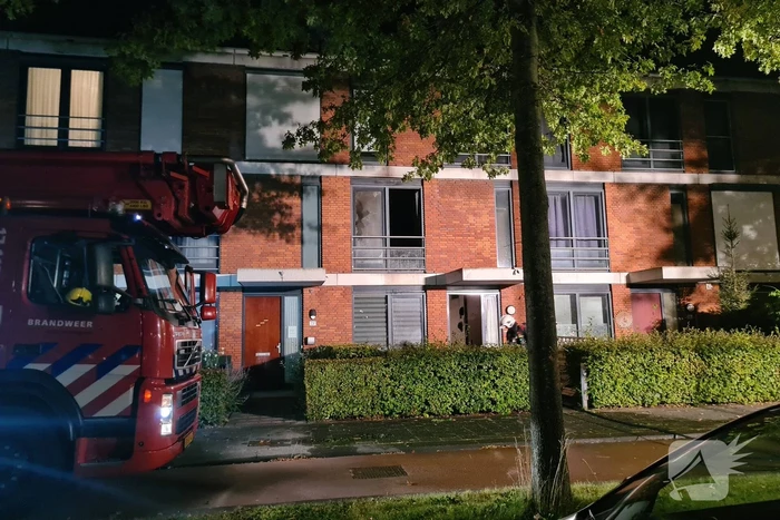 Personen en hond met klachten bij brand