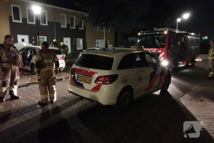 Brand gesticht in auto