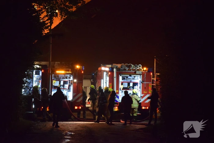 Grote uitslaande brand in loods