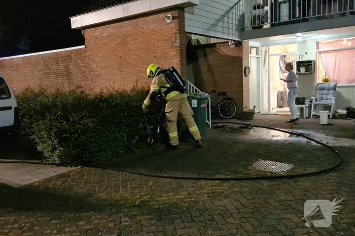 Fiets in brand bij woning