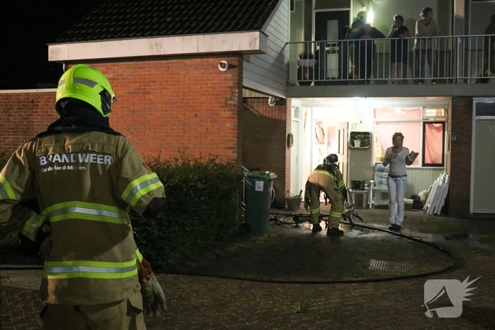 Fiets in brand bij woning
