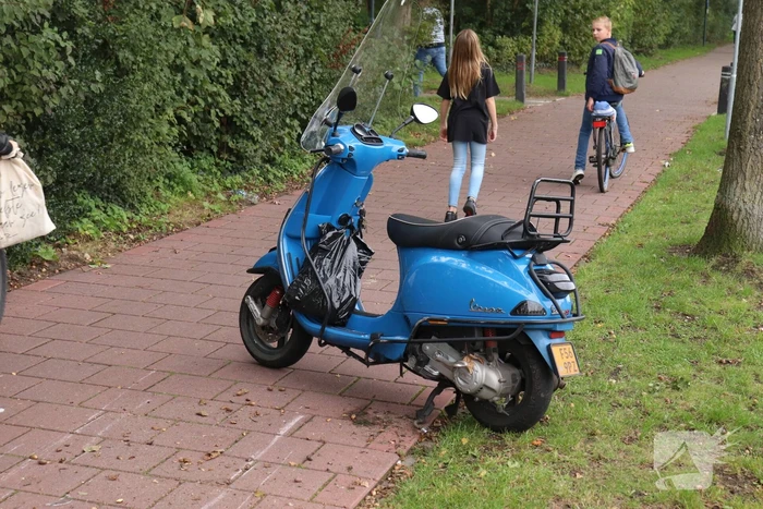Fietsster gewond na botsing met brommer op fietspad