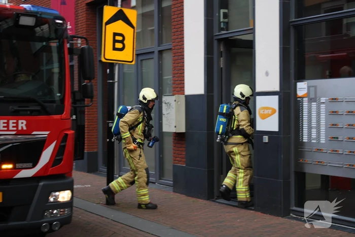 Brandweer blust brand in gebouw ICare