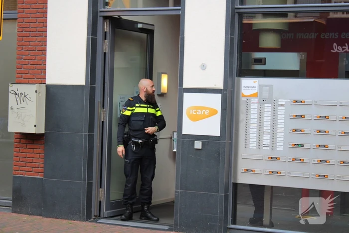 Brandweer blust brand in gebouw ICare
