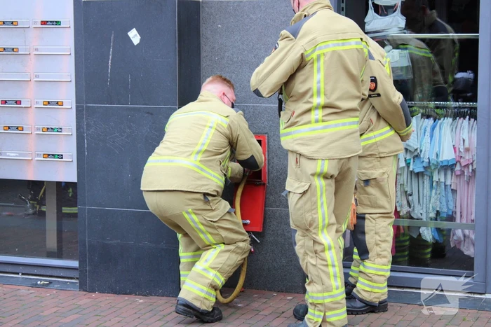 Brandweer blust brand in gebouw ICare