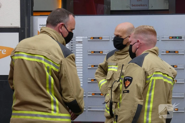 Brandweer blust brand in gebouw ICare