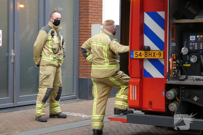 Brandweer blust brand in gebouw ICare