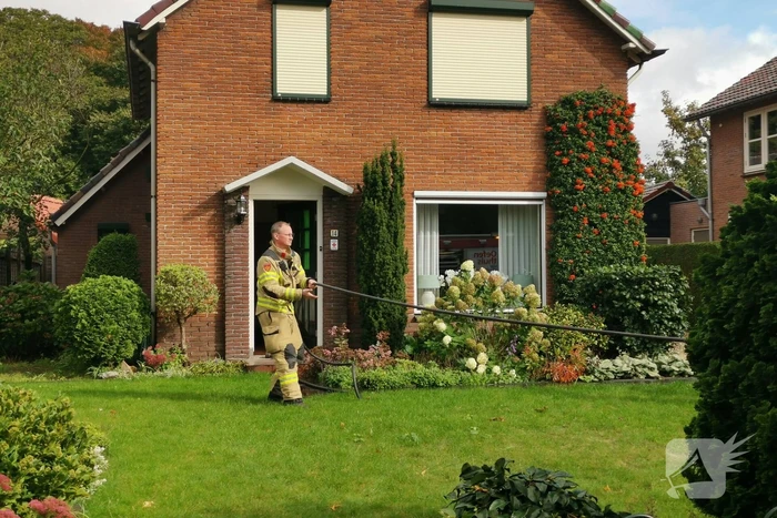 Te warme kachel veroorzaakt brand in woning