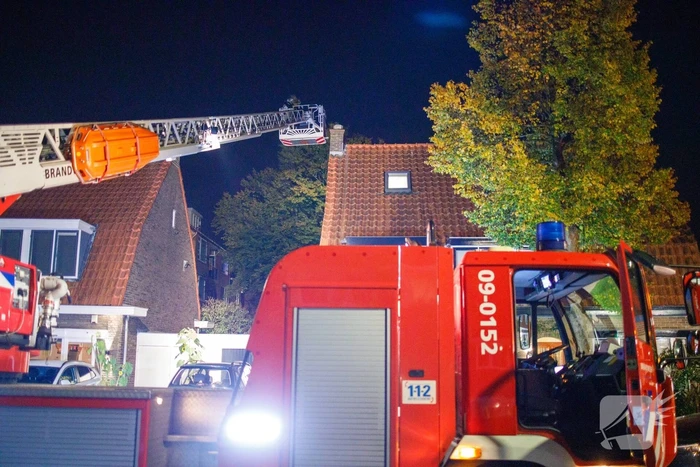 Brand in schoorsteen van woning