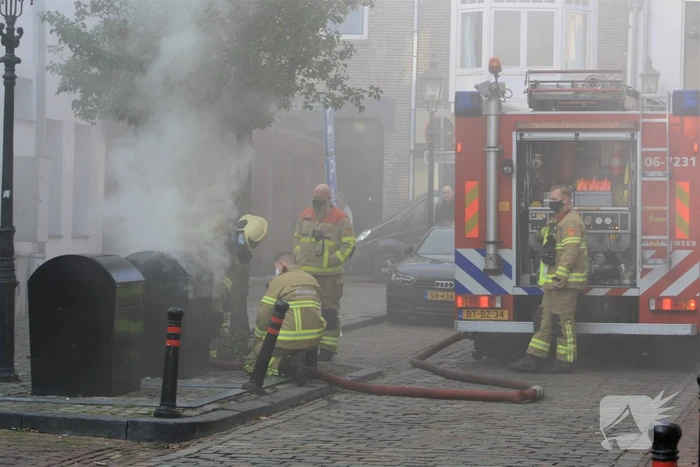 Veel rook door brand in ondergrondse container