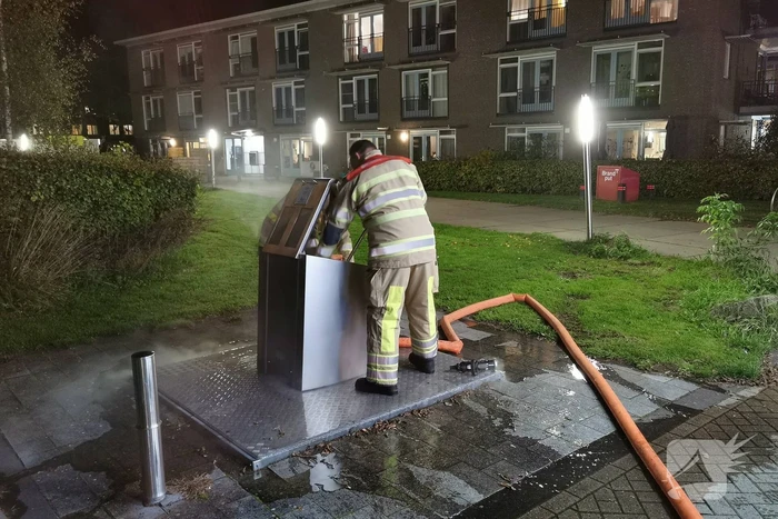 Flinke brand in ondergrondse container
