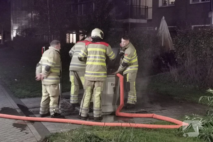 Flinke brand in ondergrondse container