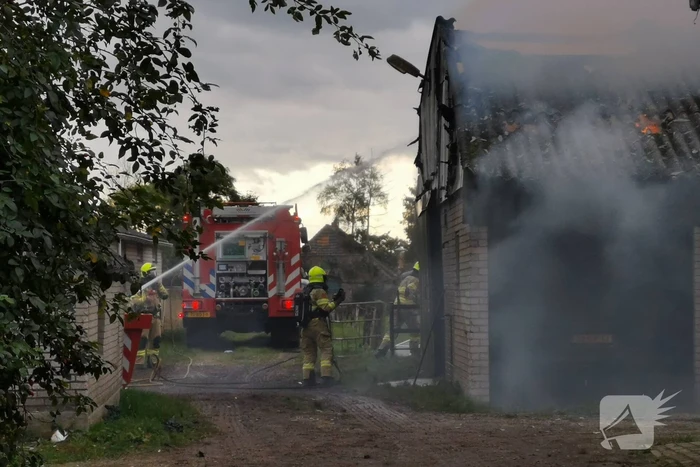 Uitslaande brand in schuur