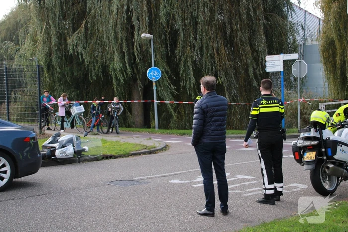 Tesla in botsing met scooter