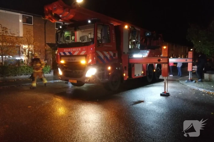 Brandweer blust schoorsteenbrand