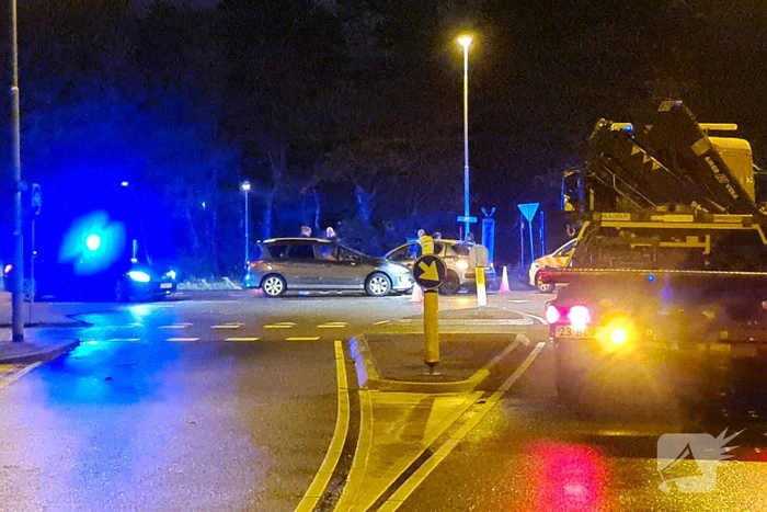 Twee auto's zien elkaar over het hoofd