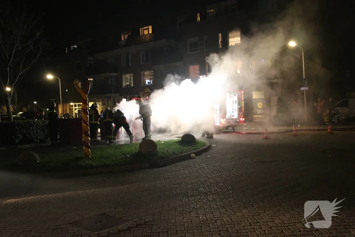 Ondergrondse container in brand