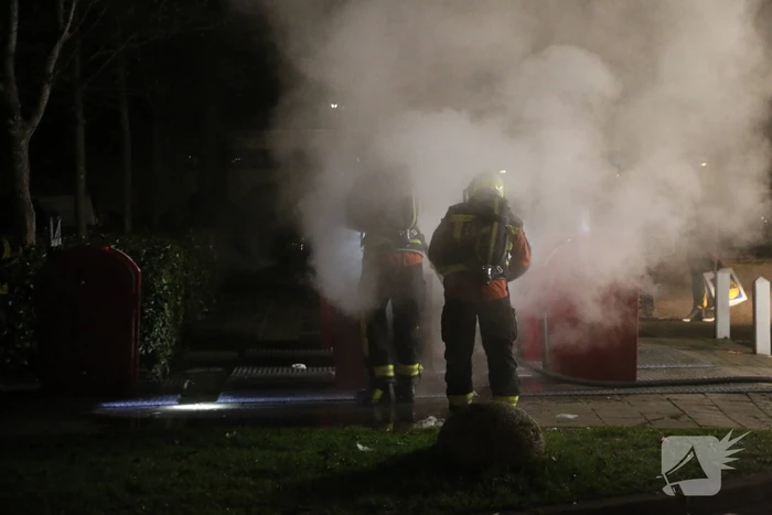 Ondergrondse container in brand