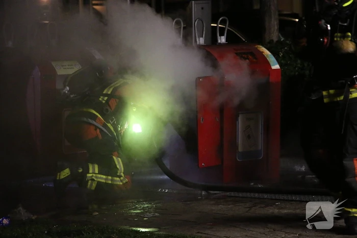 Ondergrondse container in brand