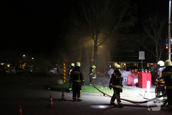 Ondergrondse container in brand